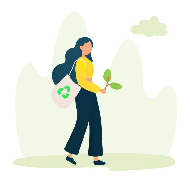 image femme marchant dans la nature avec une plante dans la main